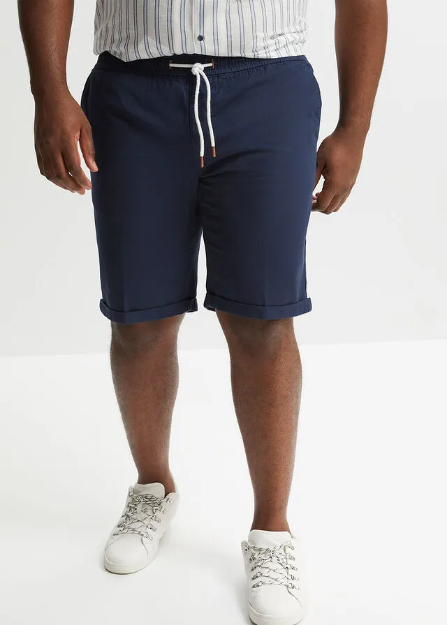 BERMUDAS CON CINTURA ELáSTICA Y CORTE REGULAR AZUL MARINOBLANCO ESTAMPADO