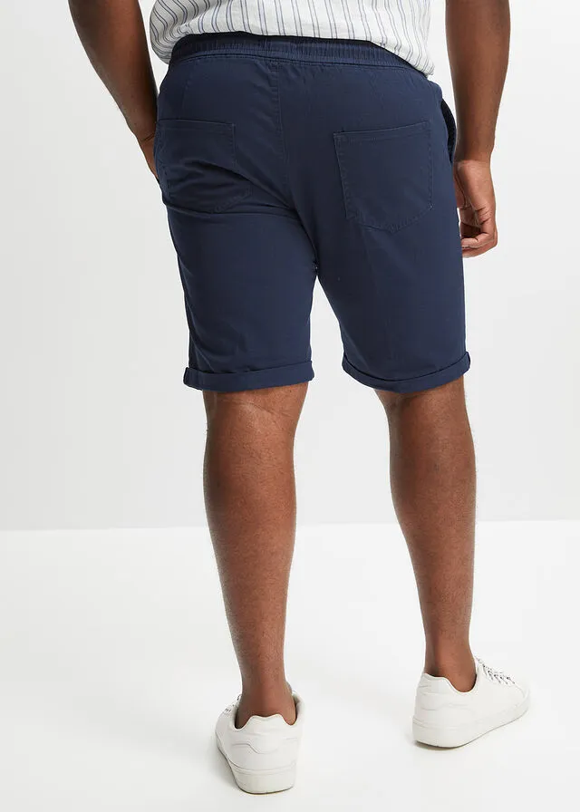 BERMUDAS CON CINTURA ELáSTICA Y CORTE REGULAR AZUL MARINOBLANCO ESTAMPADO