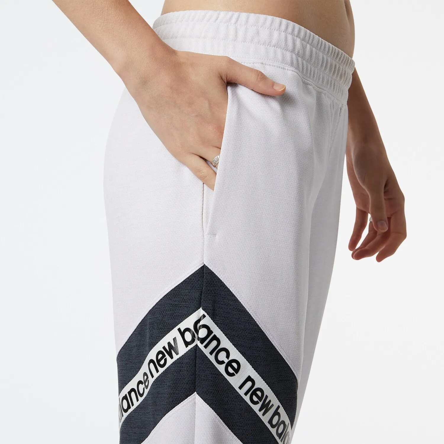 PANTALóN NEW BALANCE DE DAMA RELENTLESS TERRY  WP21180SST  WHITE