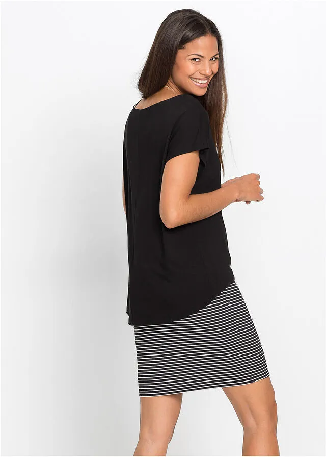 VESTIDO DE PUNTO CON FALDA DE RAYAS NEGROBLANCO